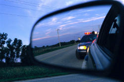 policecar seen in mirror